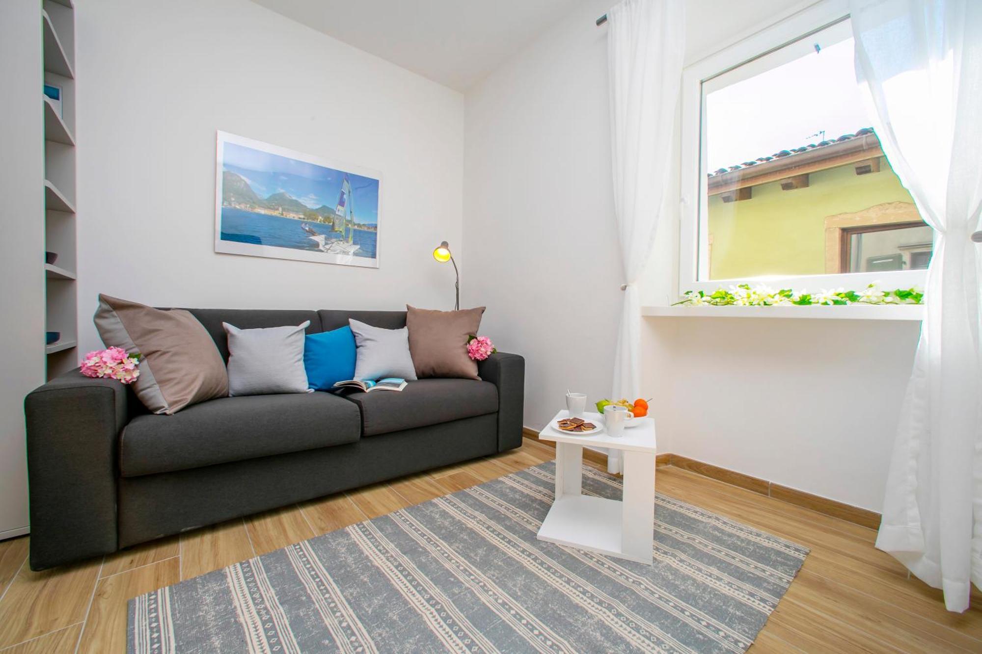 Nido Sui Tetti Di Riva Del Garda - Happy Rentals Exteriör bild