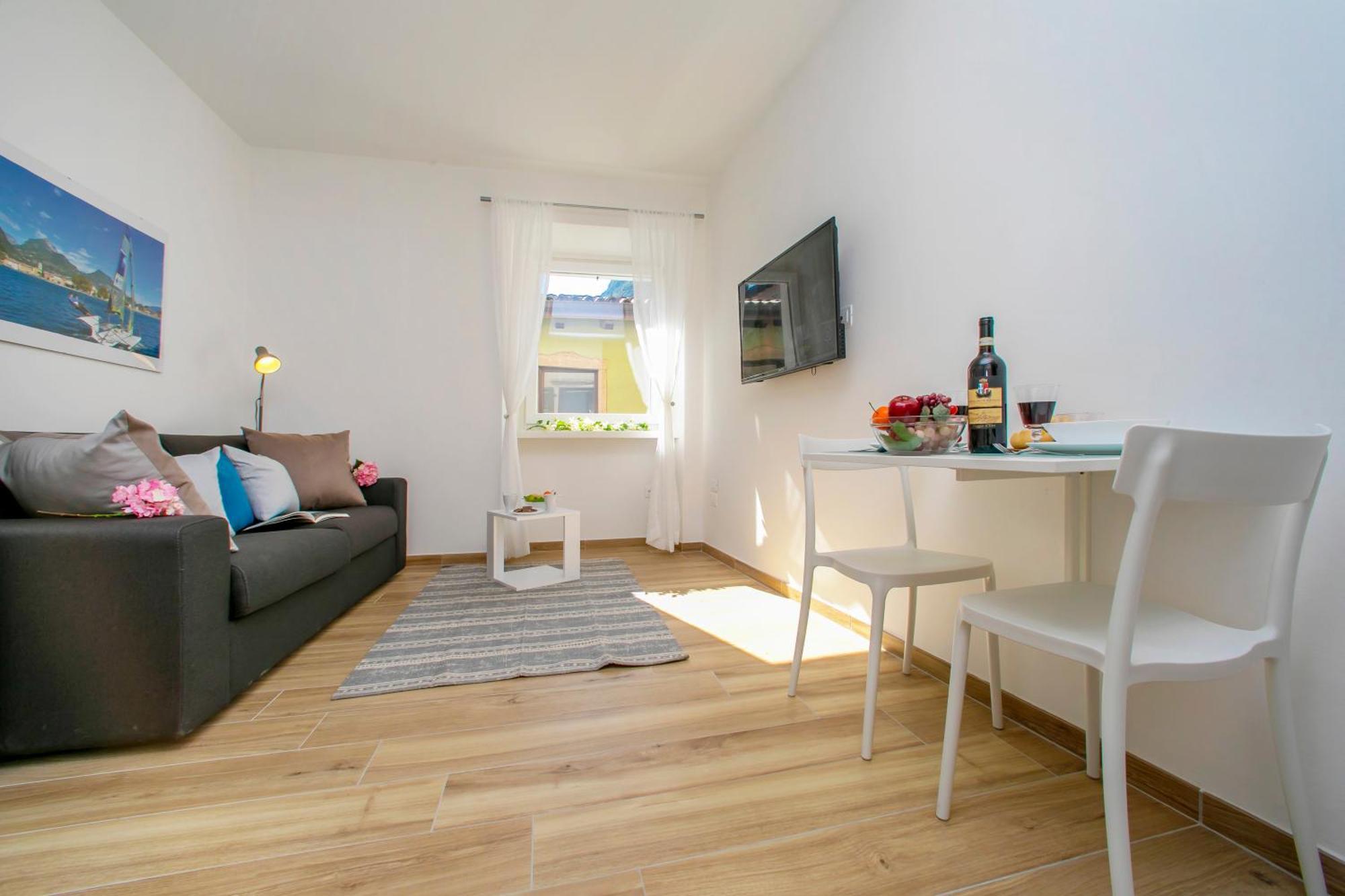 Nido Sui Tetti Di Riva Del Garda - Happy Rentals Exteriör bild