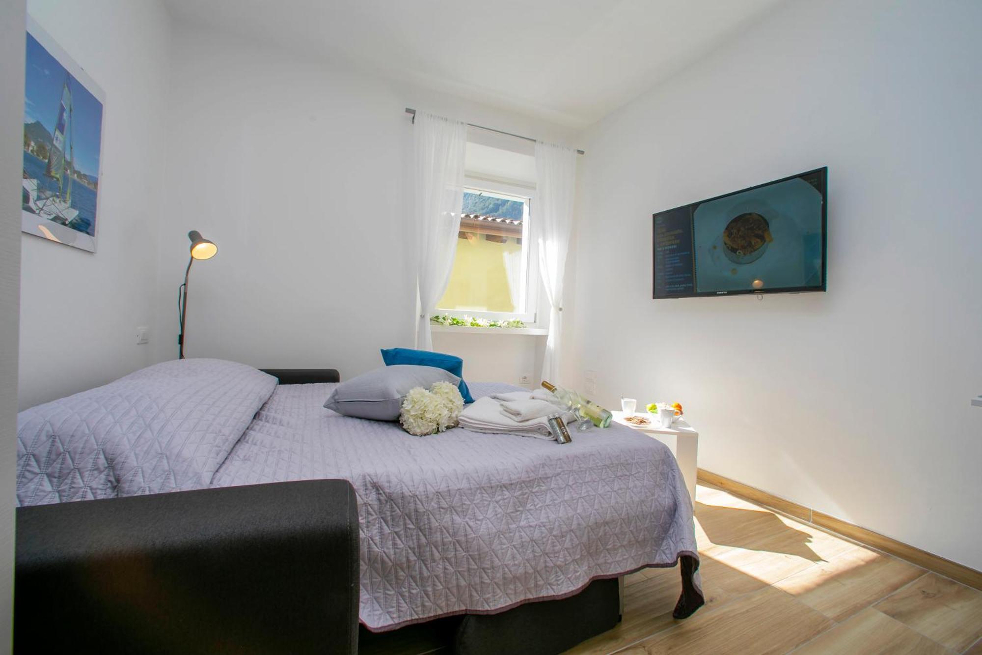 Nido Sui Tetti Di Riva Del Garda - Happy Rentals Exteriör bild