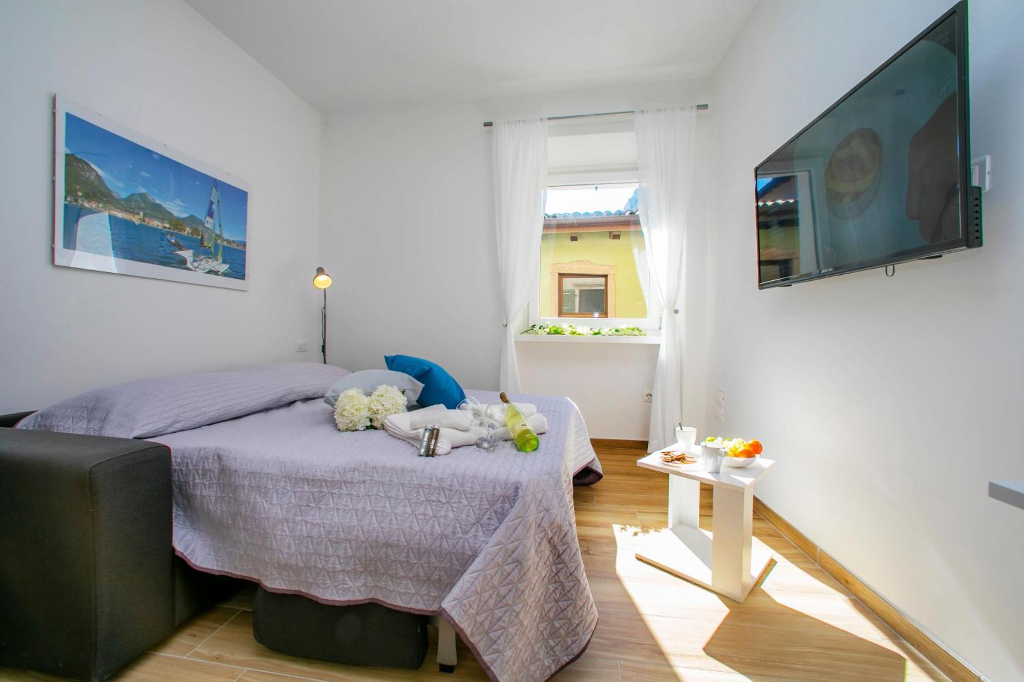 Nido Sui Tetti Di Riva Del Garda - Happy Rentals Exteriör bild